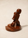 The Man wooden mobile phone stand by Utilihaus