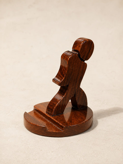 The Man wooden mobile phone stand by Utilihaus