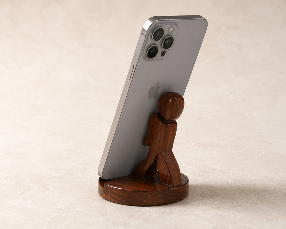 The Man wooden mobile phone stand by Utilihaus