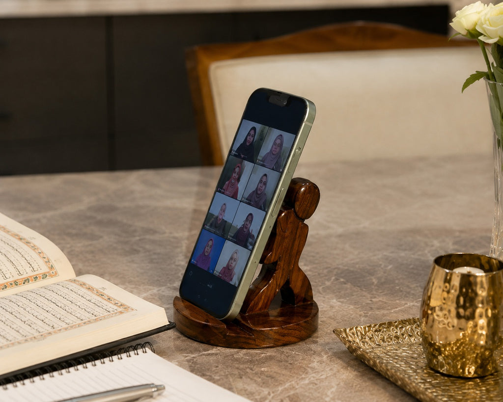 The Man wooden mobile phone stand by Utilihaus